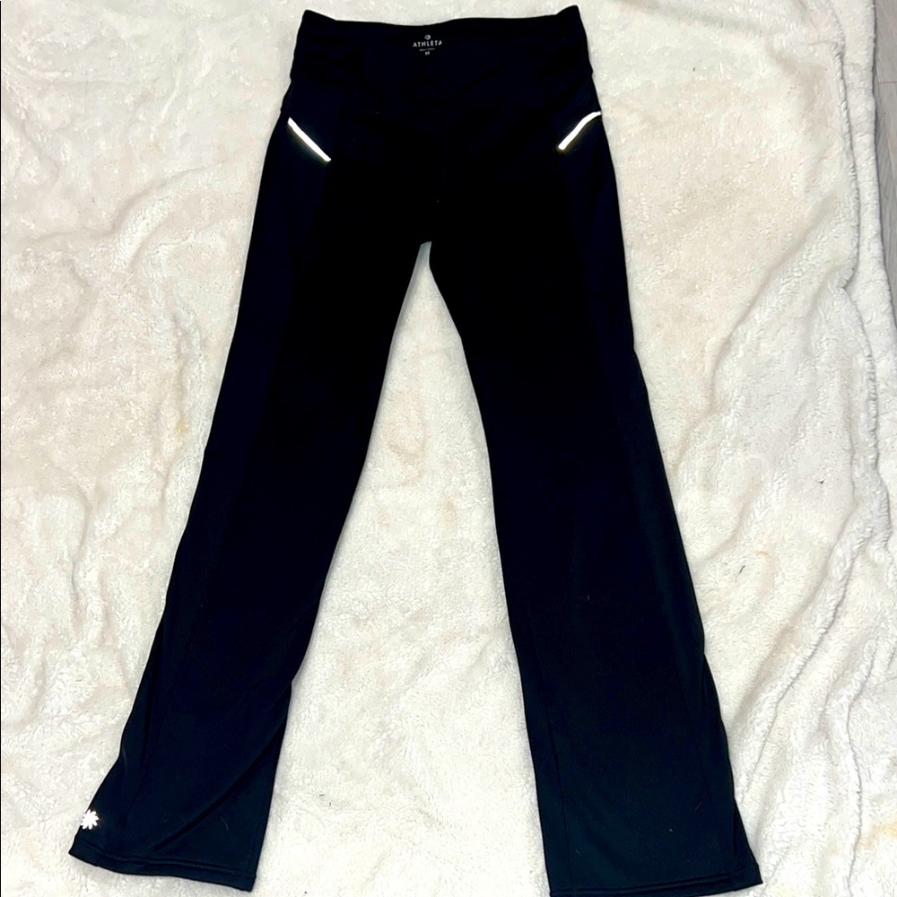 Athleta Black pants like new . Size medium with reflective adhesive